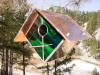 Green and White Stained Glass Bird House